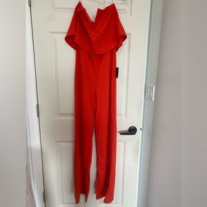 Bright orange strapless jumpsuit